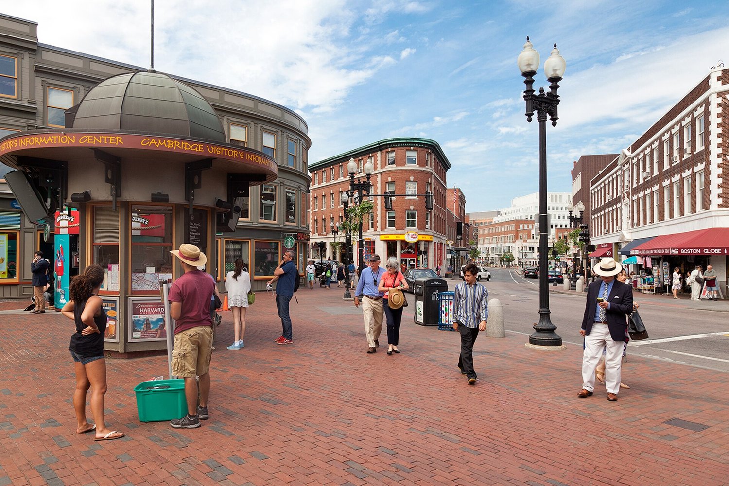 Harvard Square in Cambridge, Massachusetts — brick plaza and historic storefronts on a sunny day
